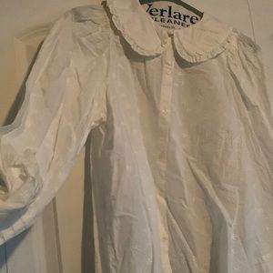 White blouse with curved collar. Never worn